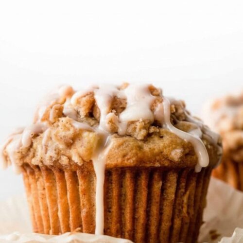 Freshly baked apple muffins with cinnamon crumble on top