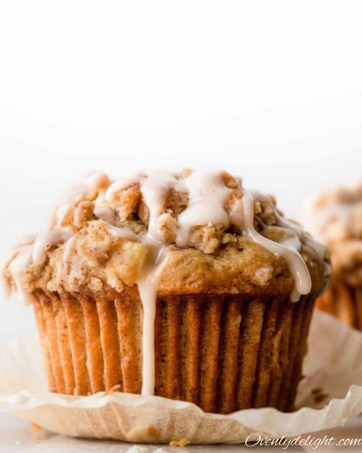 Freshly baked apple muffins with cinnamon crumble on top