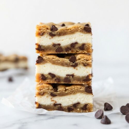 Chocolate Chip Cheesecake Bars with creamy cheesecake filling, chocolate chips, and buttery graham cracker crust