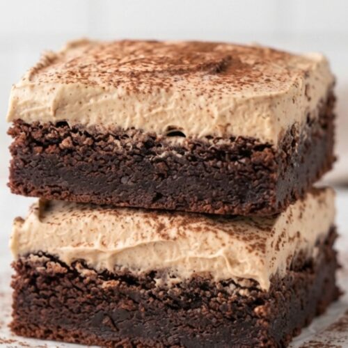 Mocha brownies sliced into squares with cafe latte buttercream