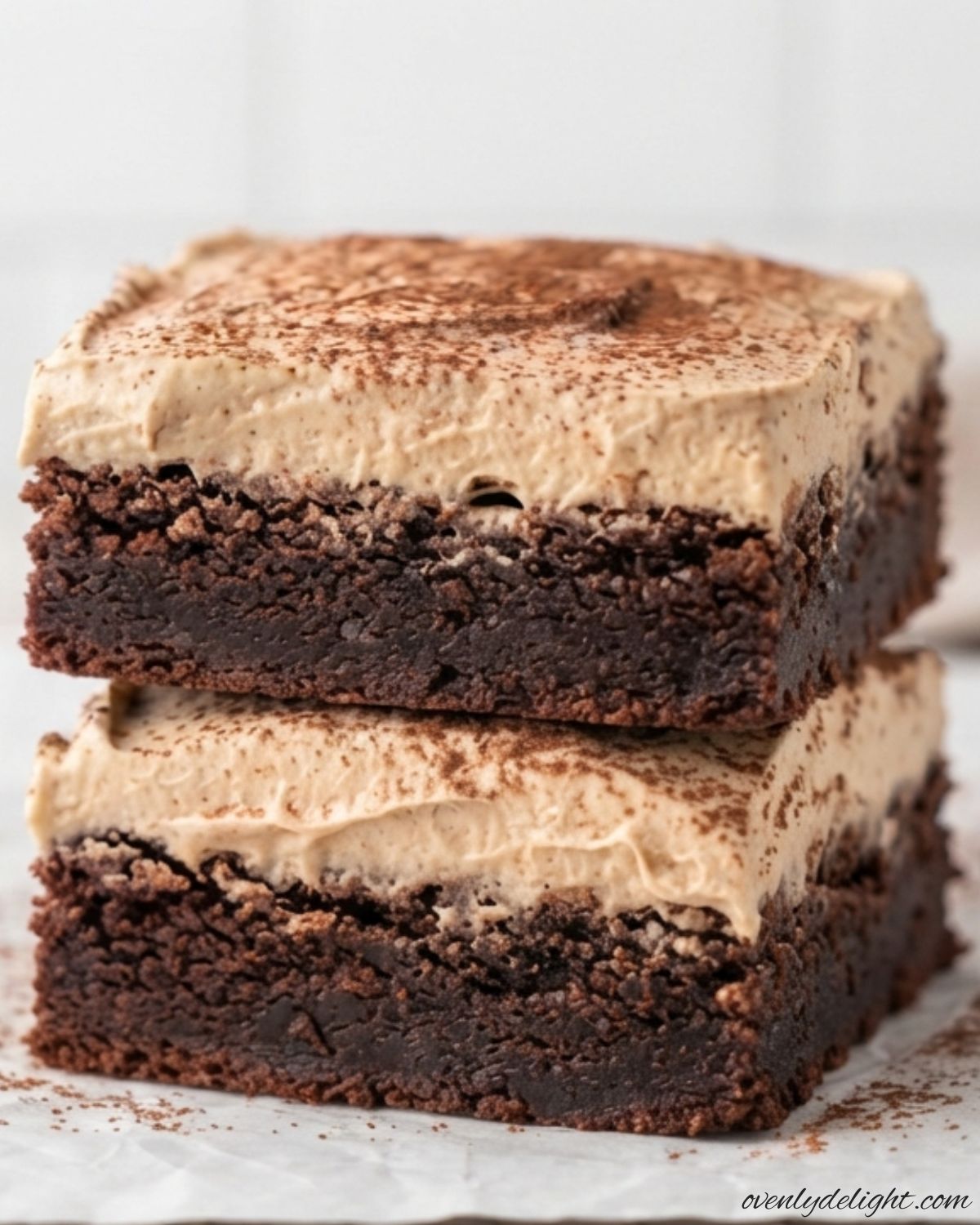 Mocha brownies sliced into squares with cafe latte buttercream